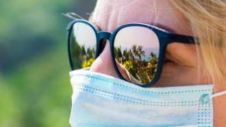 woman wearing mask in sunlight