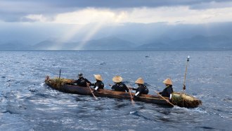 dugout canoe crafted using axes modeled off of Japanese artifacts